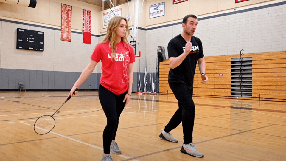 Students playing badminton together
